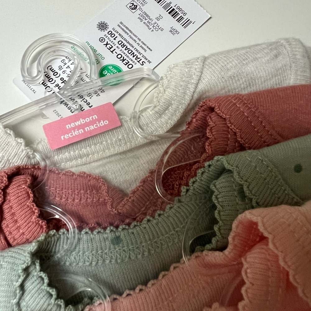 Carter’s Newborn Ribbed Bodysuits 4-Pack - Picture 2 of 2